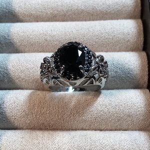 Large Black Sapphire Placed in Silver Plated Metal